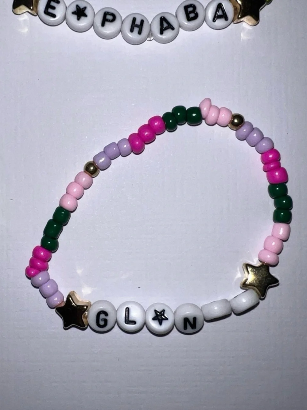 4 Wicked beaded bracelets.